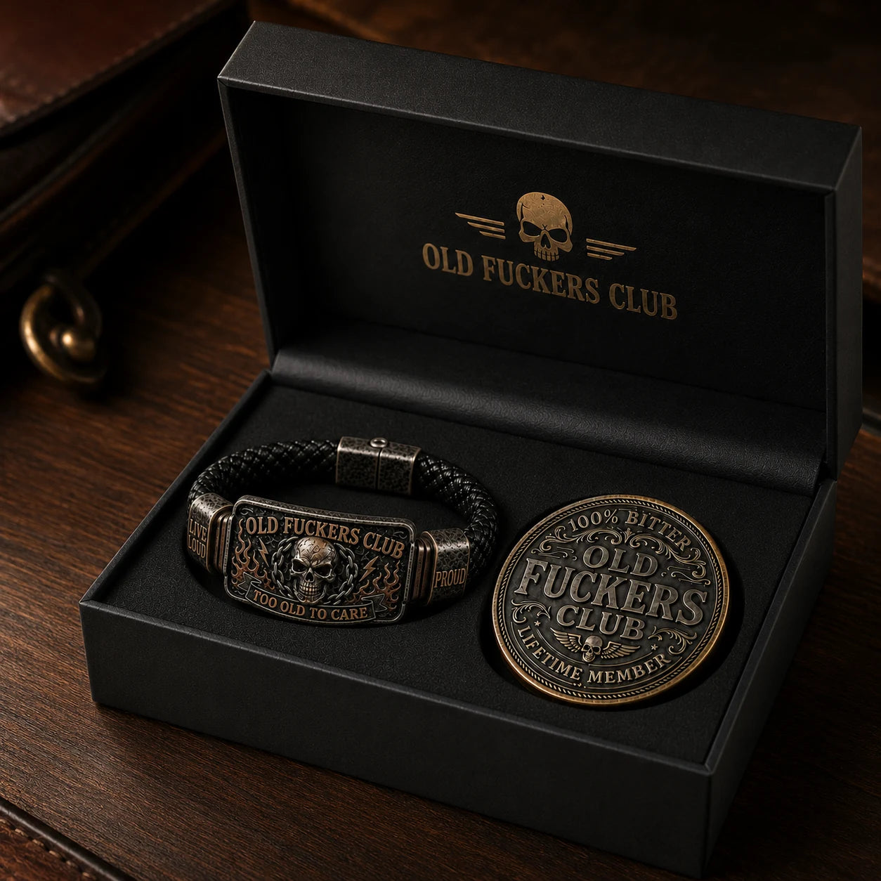 Older man wearing the Old Fuckers Club bracelet beside the collector coin and gift box